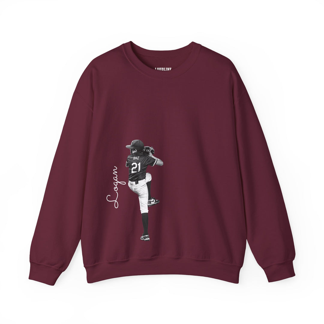 Maroon sweatshirt with graphic of a person in a sports uniform and &