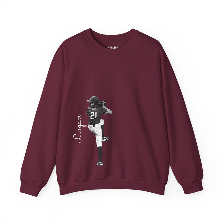 Maroon sweatshirt with graphic of a person in a sports uniform and &