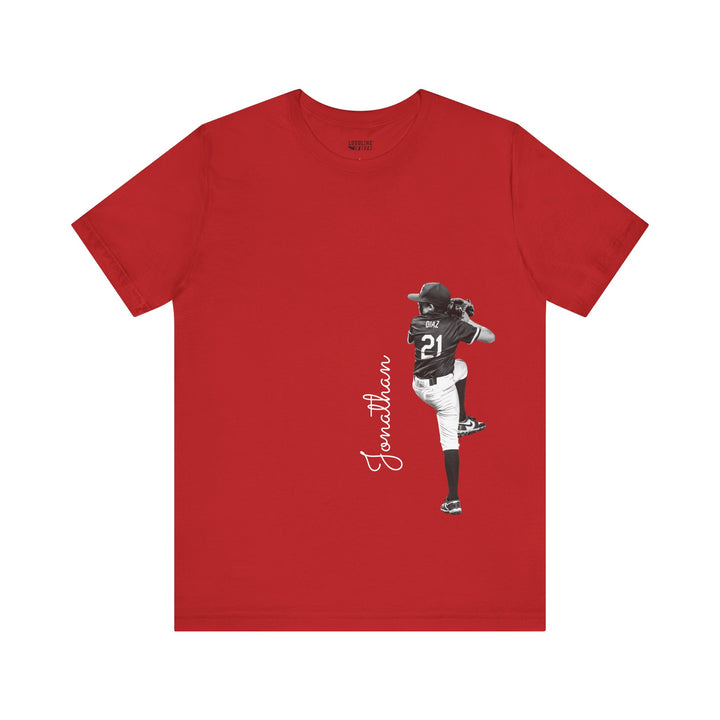 Red t-shirt with a graphic of a baseball player and the name &