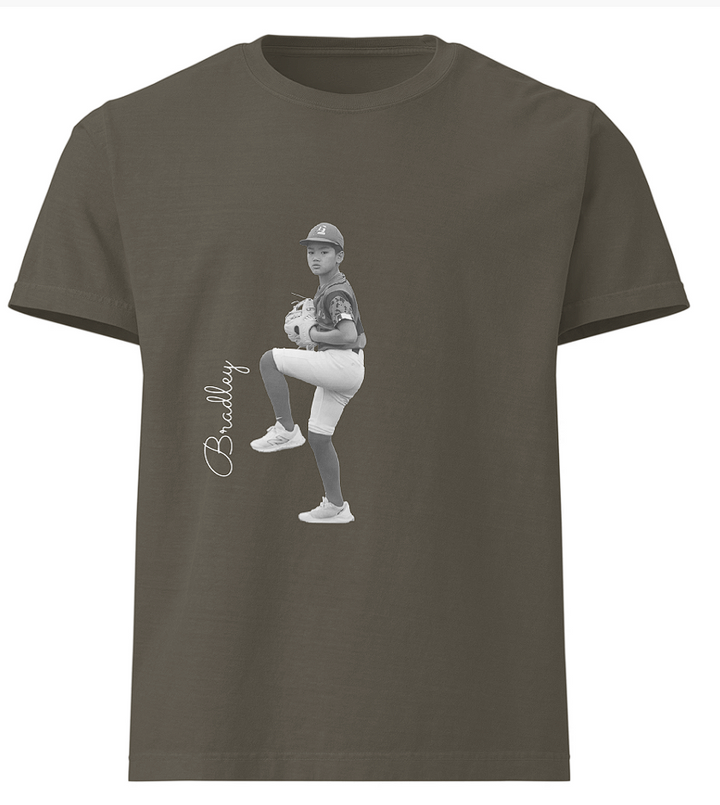 Dark gray t-shirt with a graphic of a baseball player and the name &